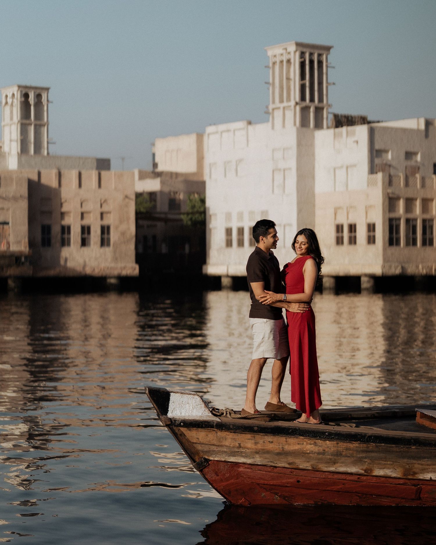 Couple photoshoot in Dubai with traditional architecture backdrop