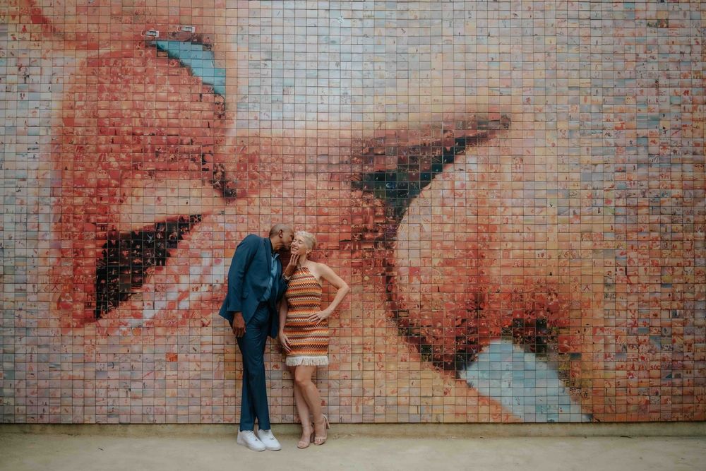 Salsa dancers couple posing elegantly in Barcelona Old City streets