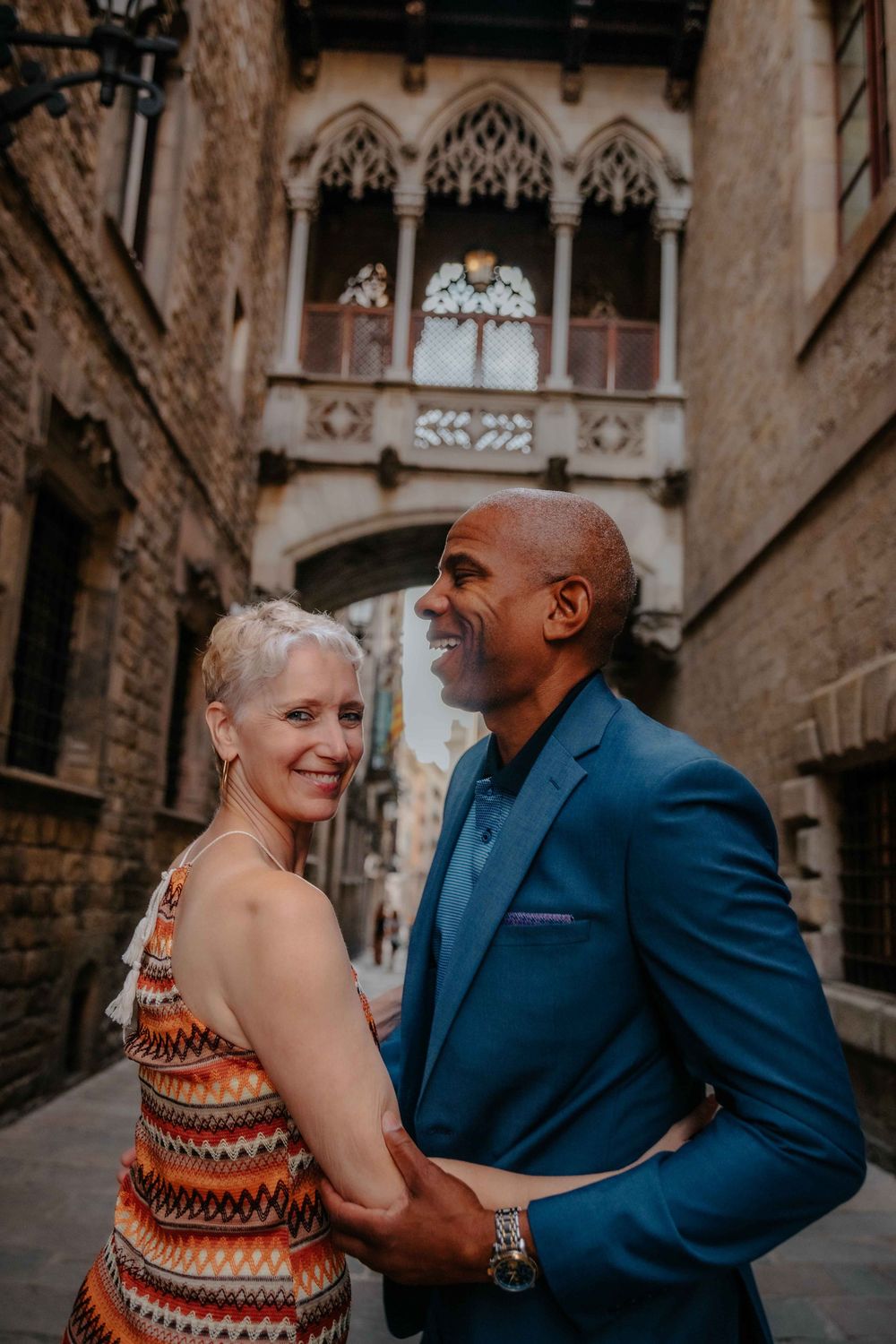 Close up of wife smiling at husband during natural couples photoshoot Barcelona.