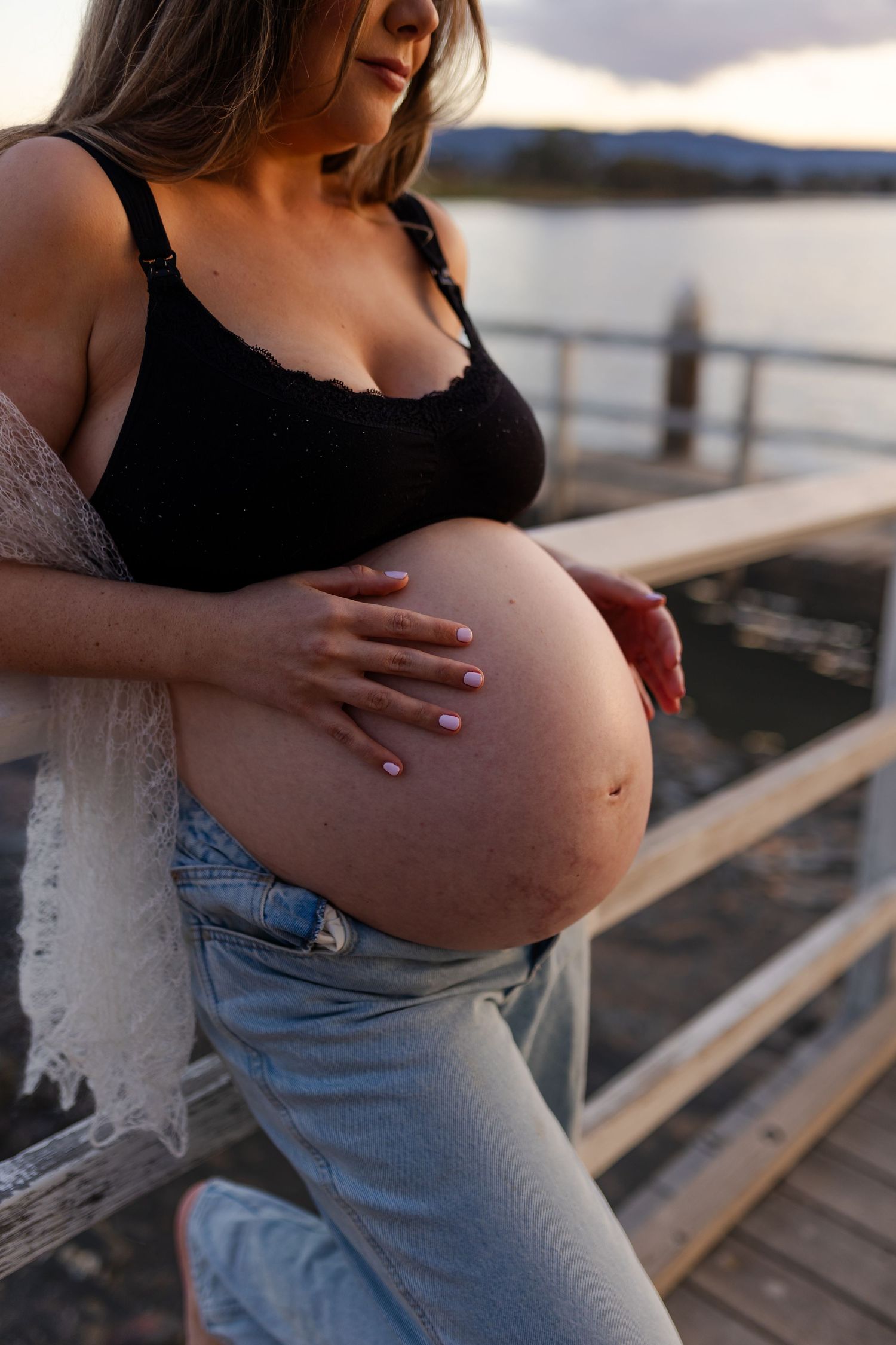 Maternity photos at Lake Illawarra photographed in warm autumn tones