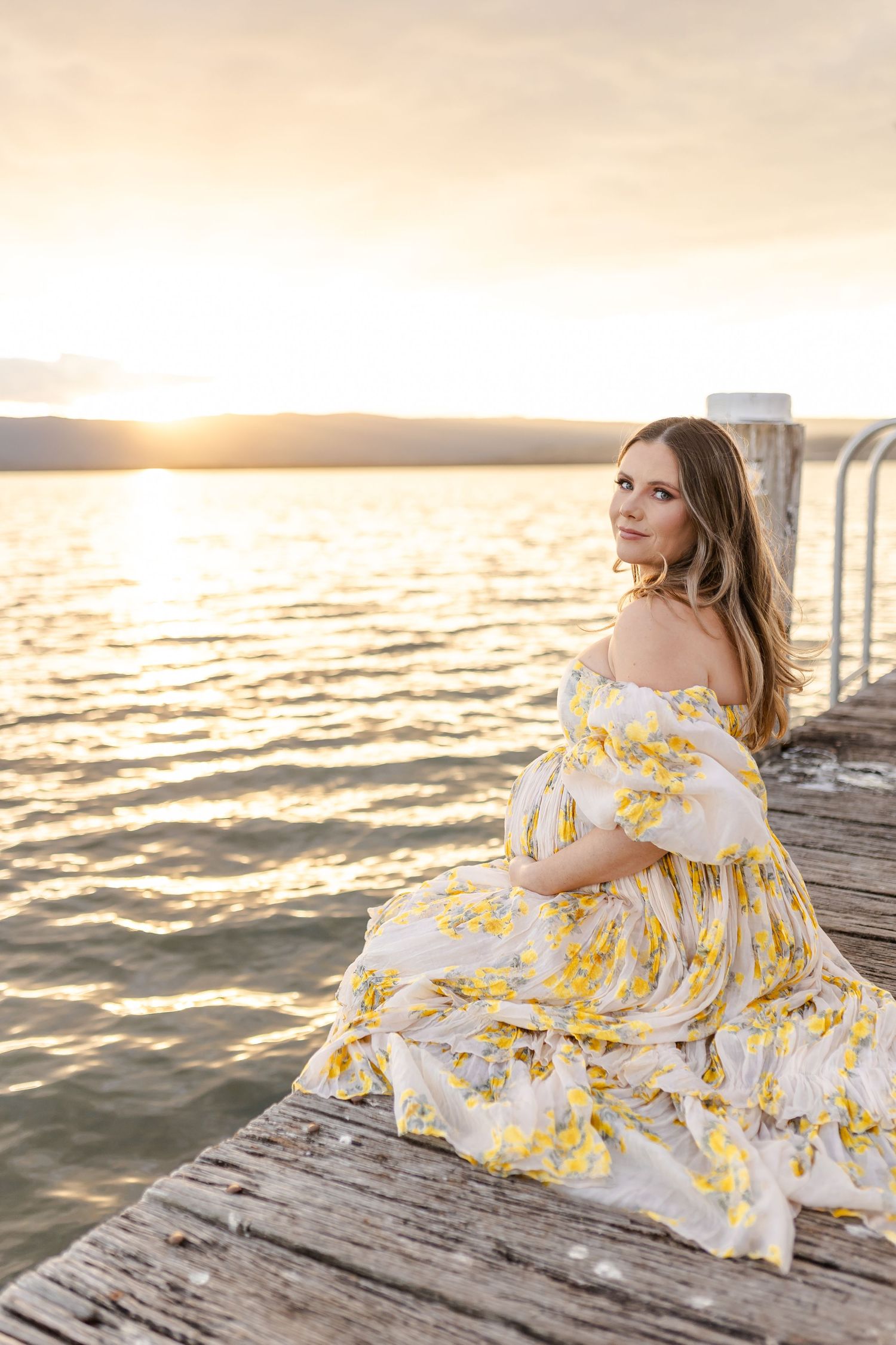 Maternity photos at Lake Illawarra photographed in warm autumn tones