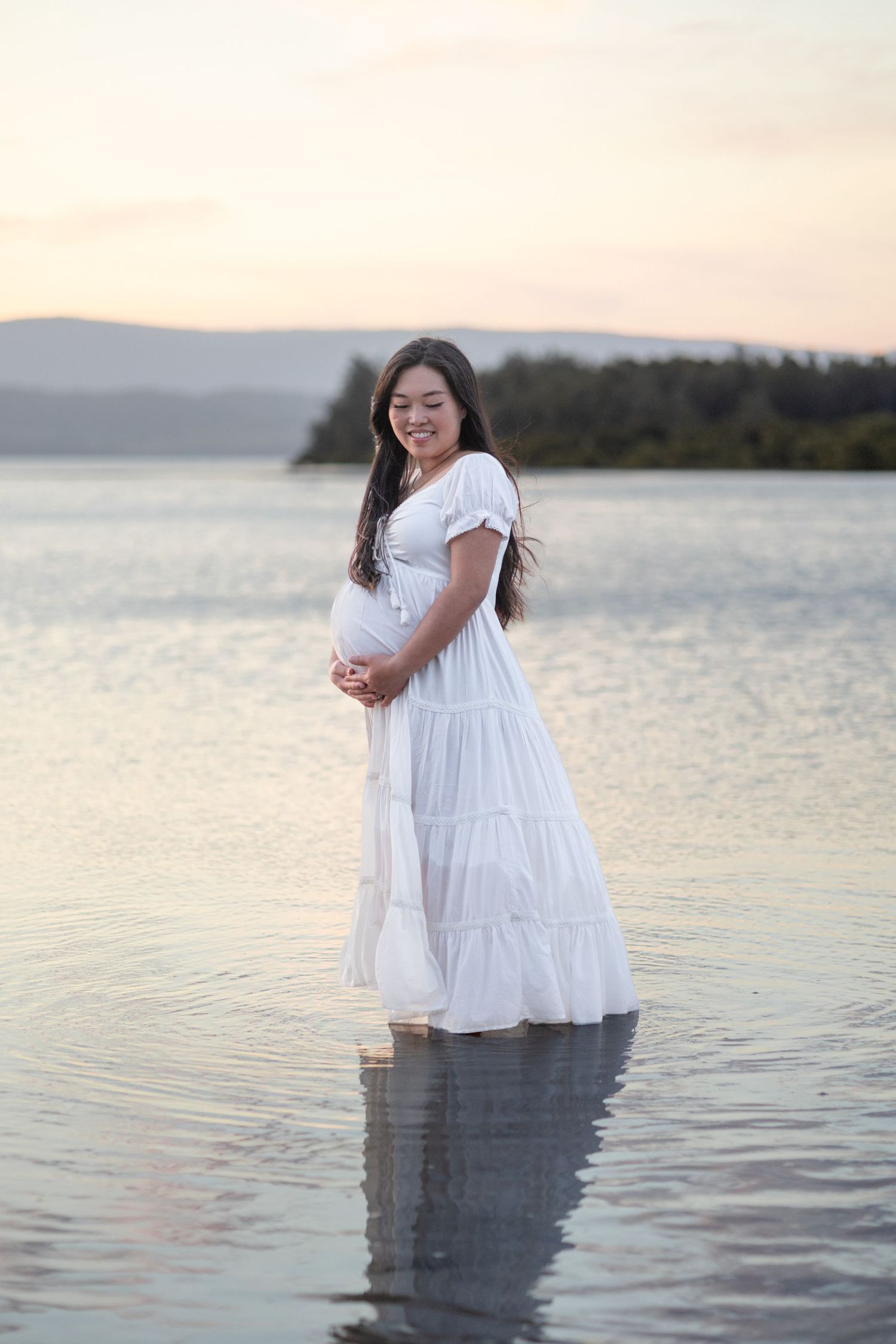 Maternity photos at Lake Illawarra photographed with beautiful sky at sunset