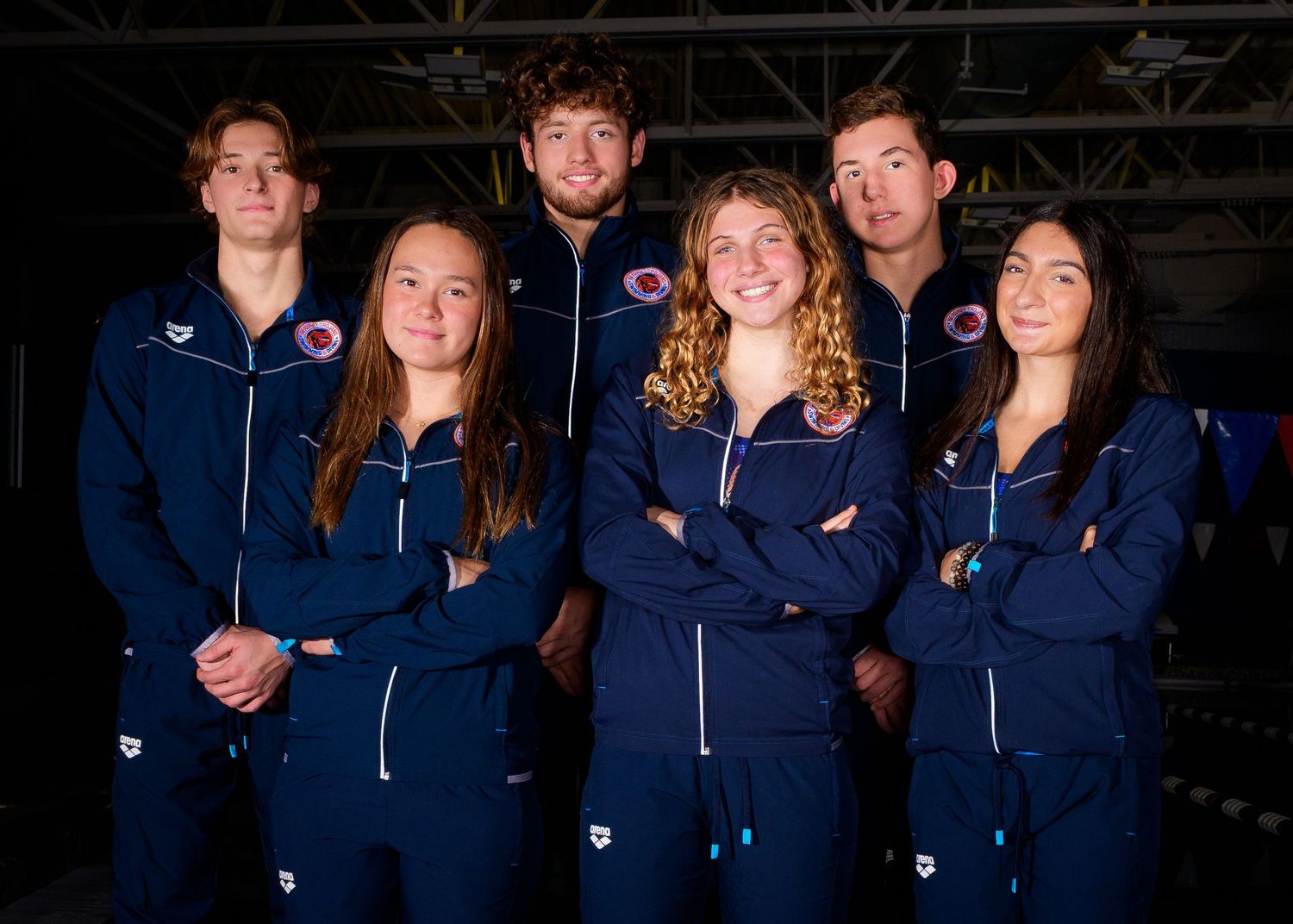 Hershey High School Trojan swim team with blue warmup , by SportsFox Photography, Hershey PA