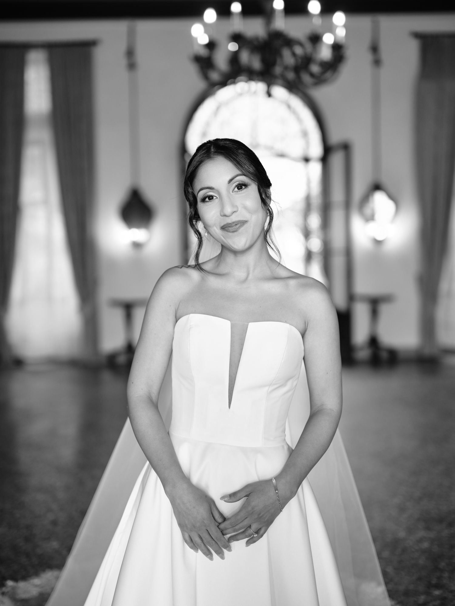 Classic bridal portrait series showing different angles of a modern white wedding gown in a luxurious venue.