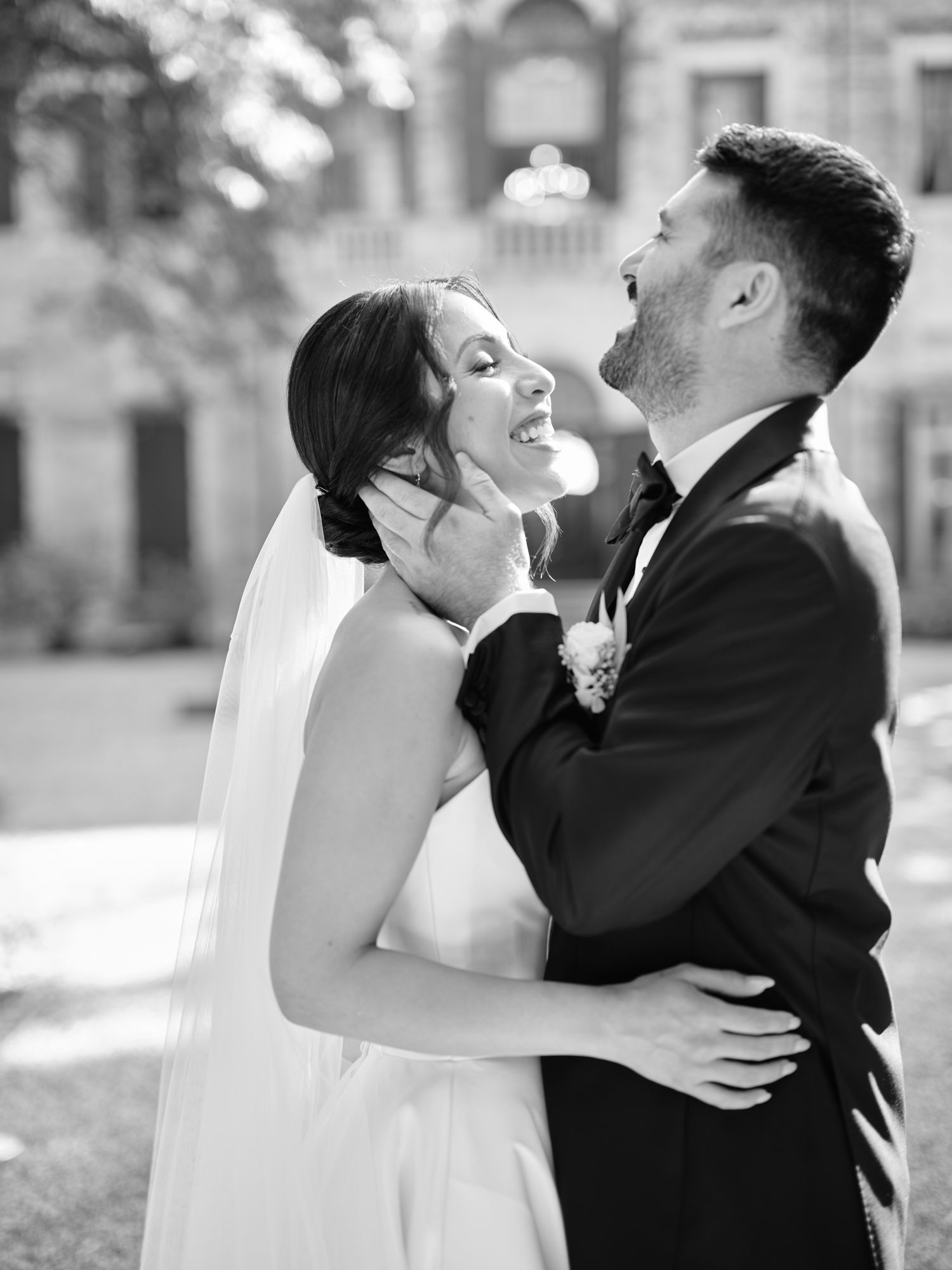 A romantic black and white photo sequence shows a couple in wedding attire sharing joyful embraces and laughter outdoors.