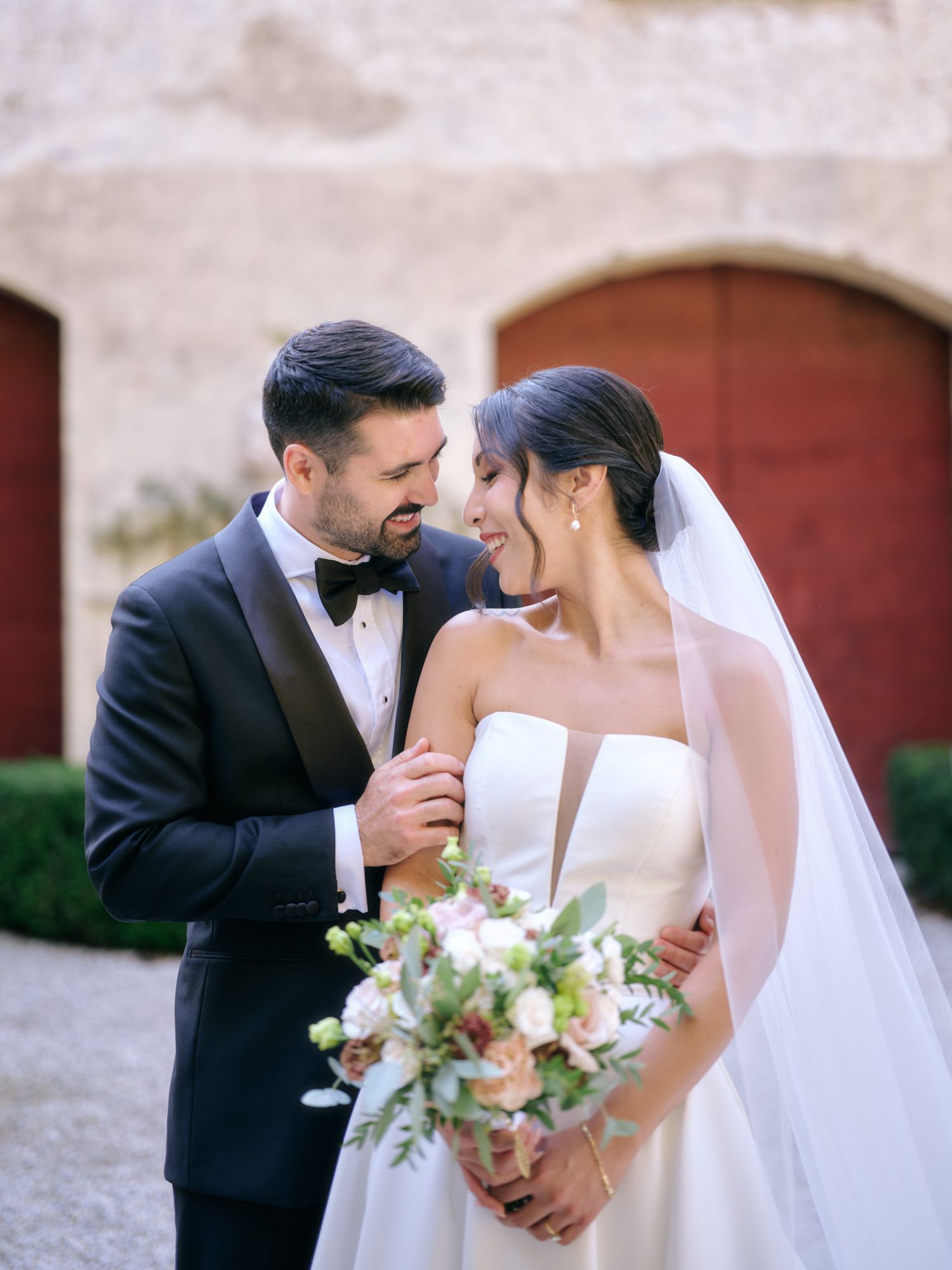 A romantic wedding photo sequence showing intimate moments between a couple in formal attire with white floral bouquet.