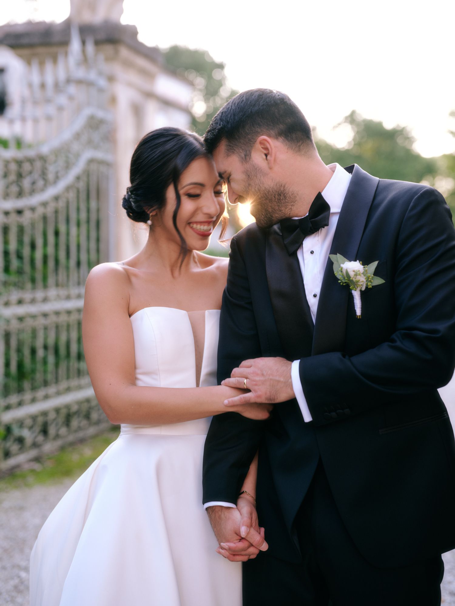 A romantic wedding couple shares intimate moments in a series of candid outdoor photographs.