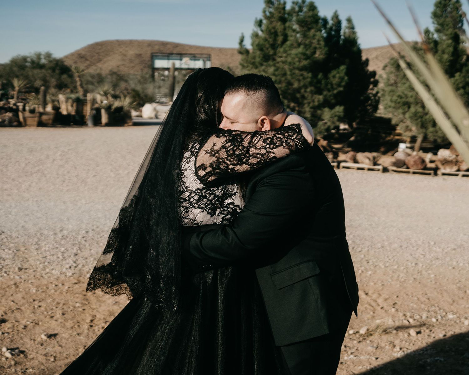 A series of candid outdoor photos showing a couple embracing and sharing intimate moments against a natural backdrop.