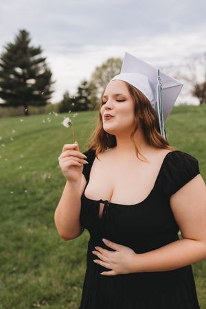 senior girl white cap and gown New Haven high school shamrocks black dress