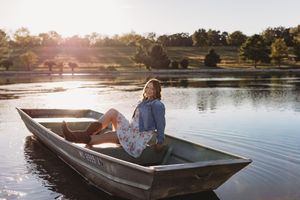 high school senior girl, senior portrait, boat, fishing, flowers, New Haven mo