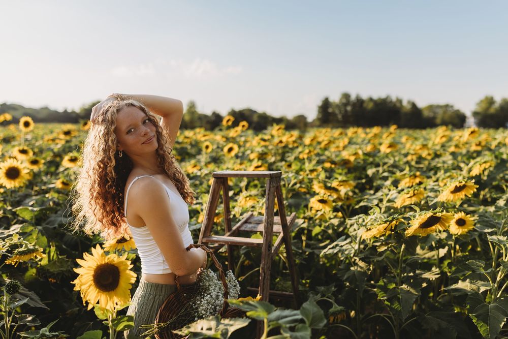 sunflower ladder blue sky senior girl