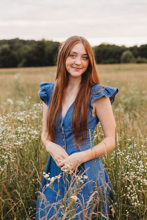 senior farm field girl red hair bluejeans dress