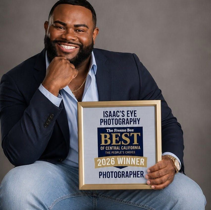 Isaac's Eye Photography 2026 Best of Central California Photographer Winner holding award in Fresno