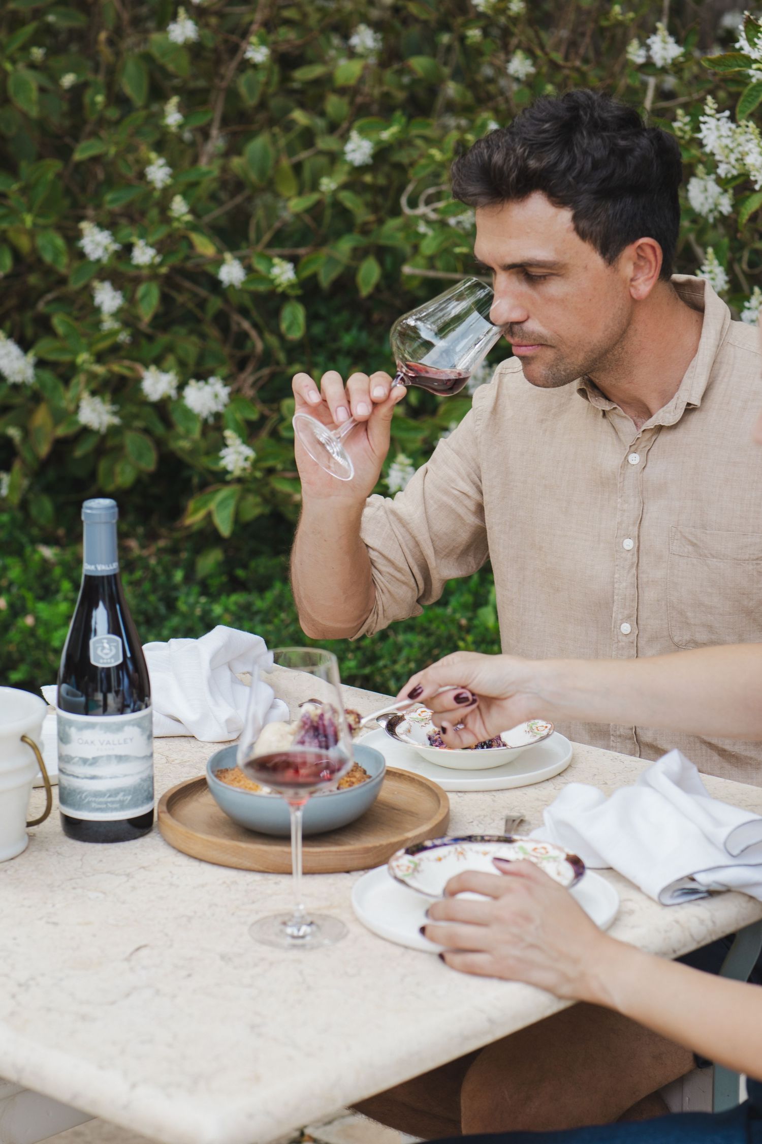 Guests enjoying wine tasting experiences at Oak Valley Wine Estate in Elgin
