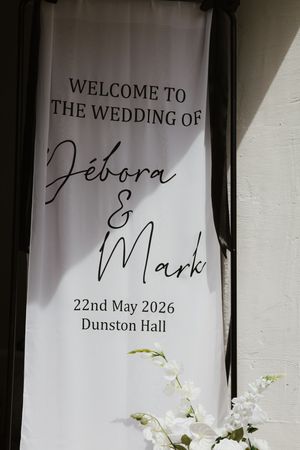 Elegant wedding welcome sign for Debora and Mark on 22nd May 2026 at Dunston Hall.