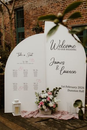 Wedding welcome sign for James and Lauren at Dunston Hall on 1st February 2026 with floral arrangement.