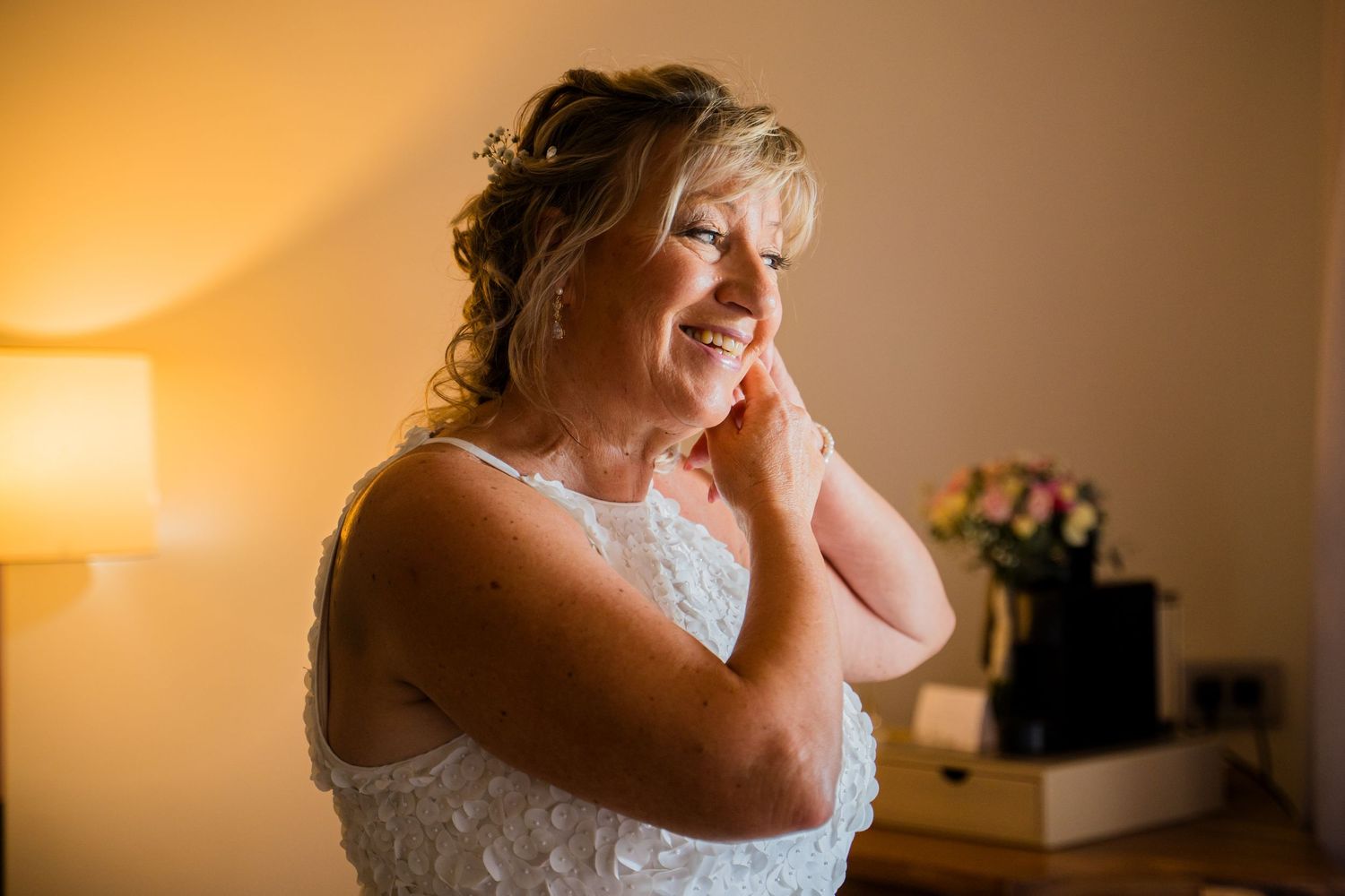 Bride laughing during wedding morning preparations at a luxury resort in Mauritius