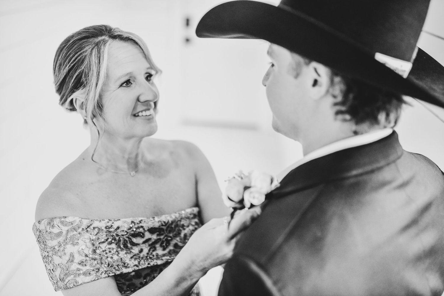 Groom preparing for ceremony with family and friends