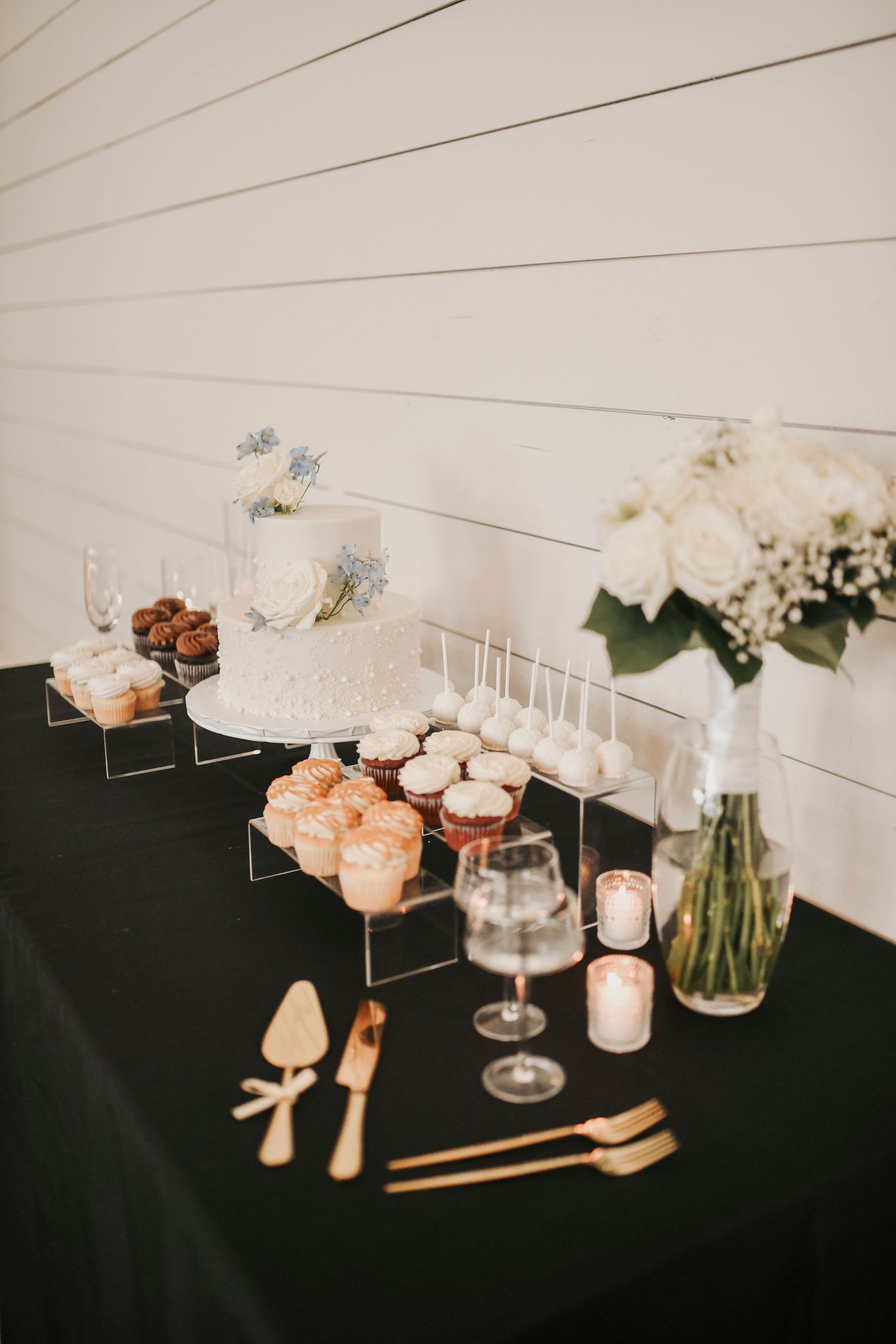 Newlyweds share cake cutting moment during reception