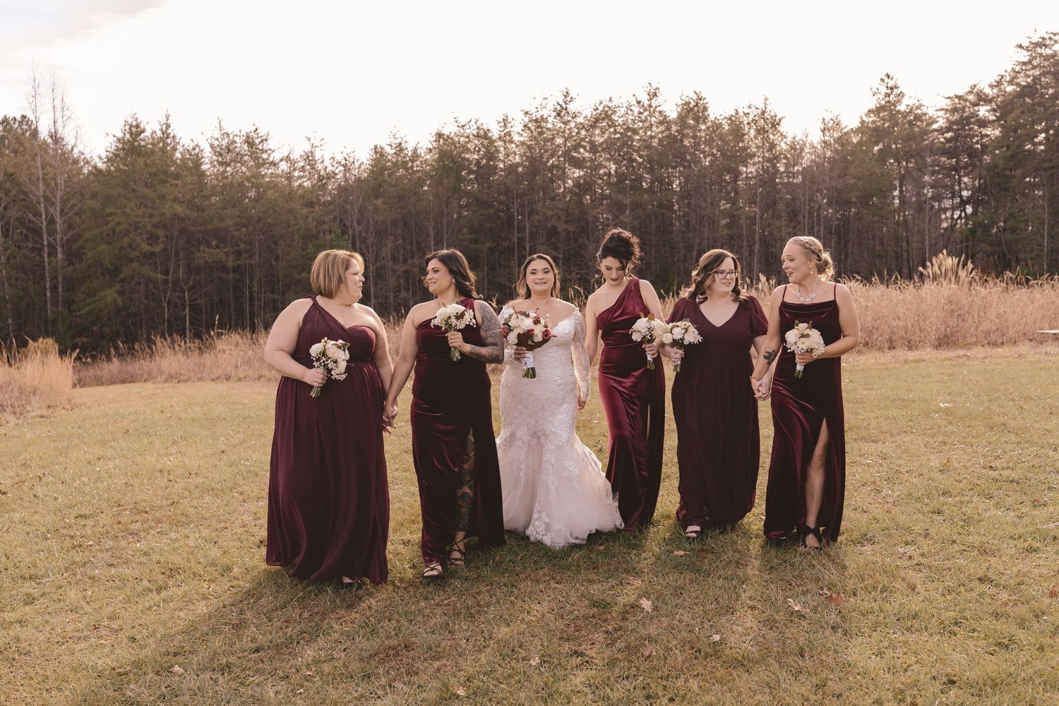 Bridal party walking together before the ceremony at Lunas Trail Farm in Westfield, NC