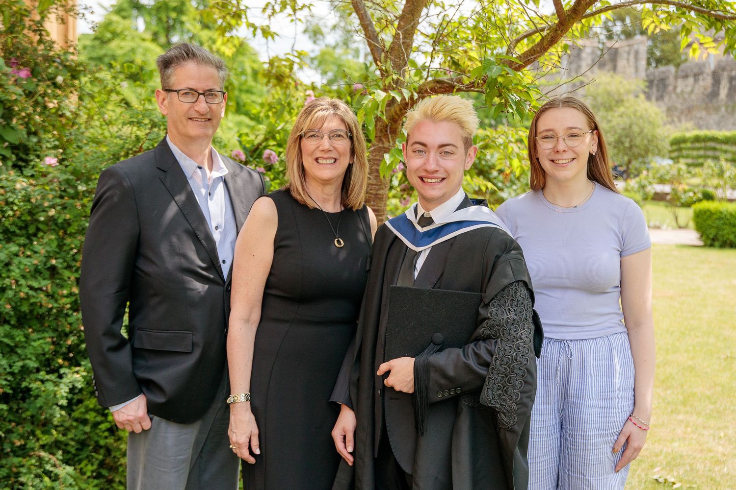 family photo on graduation day at Oxford New College