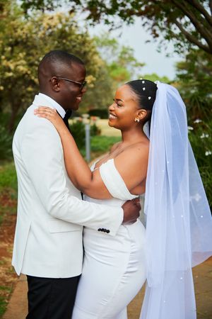 Romantic wedding photo sequence showing tender moments between newlyweds in a garden setting.