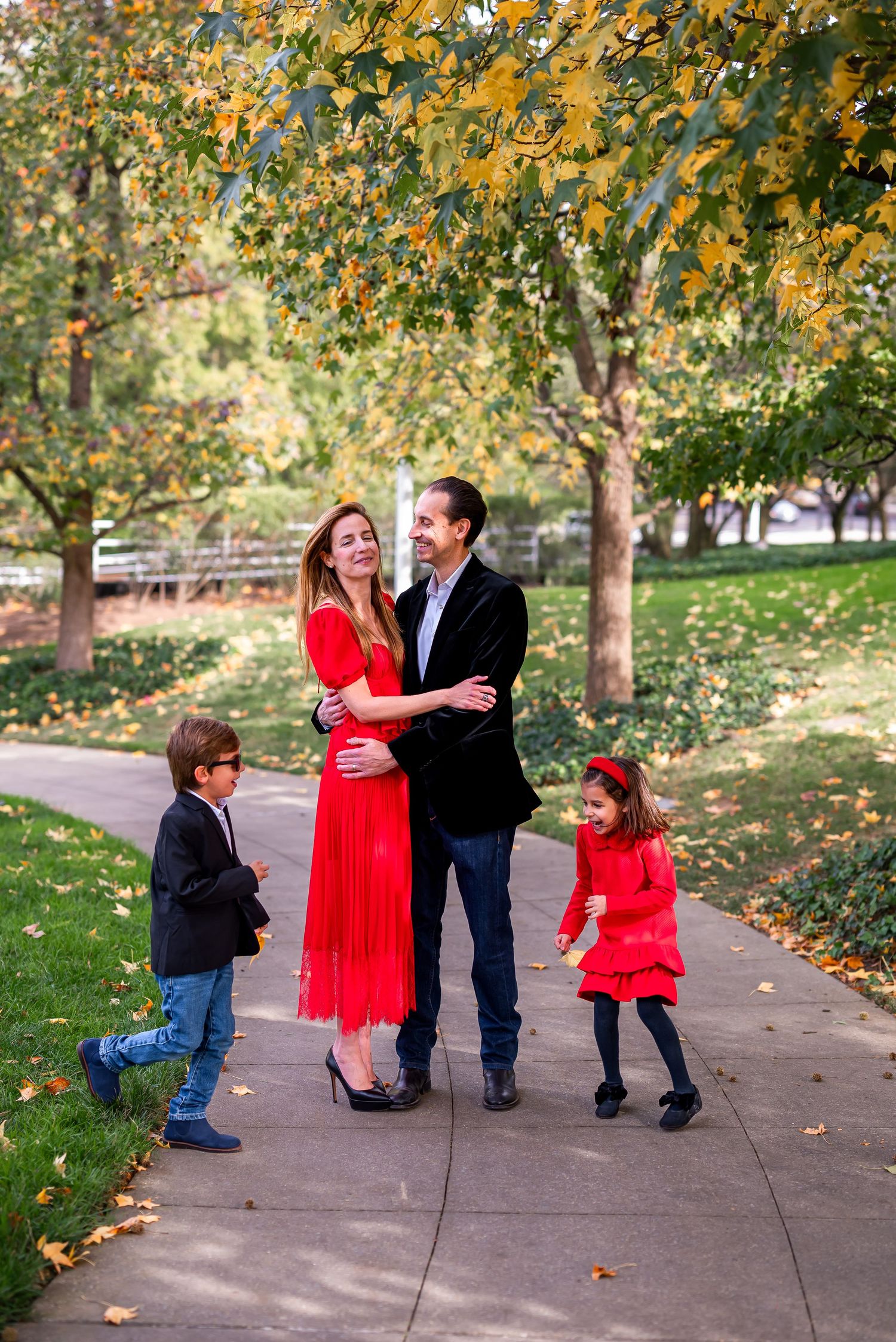 Elegant family photo session at the Kennedy Center in Washington, D.C., featuring stunning indoor chandeliers, panoramic