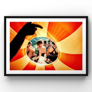 Retro-styled framed photo with orange and red sunburst pattern featuring a circular inset photograph.