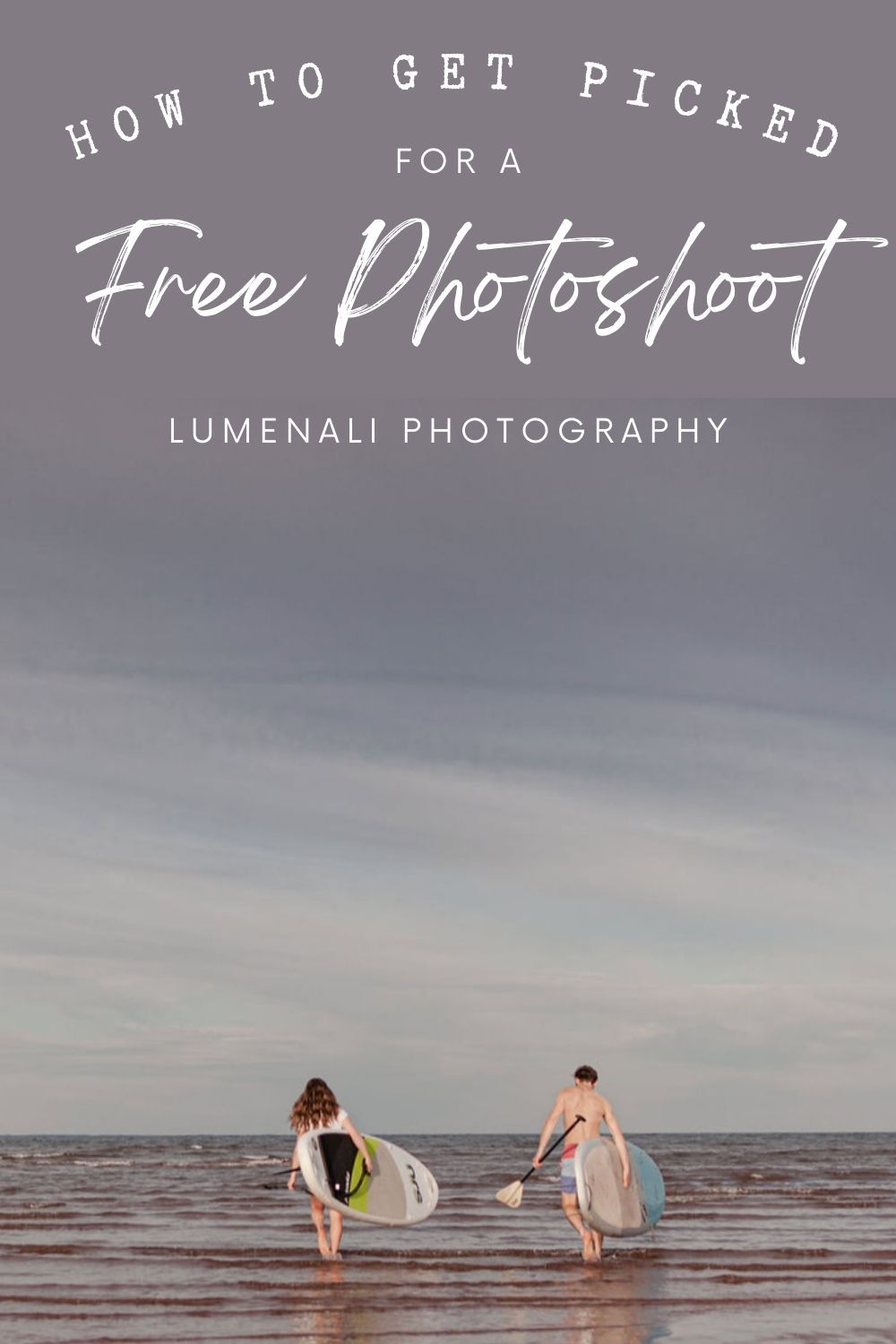Couple walking into the ocean with paddleboards during a cinematic beach photoshoot in Ontario, with text overlay. Lumenali Photography