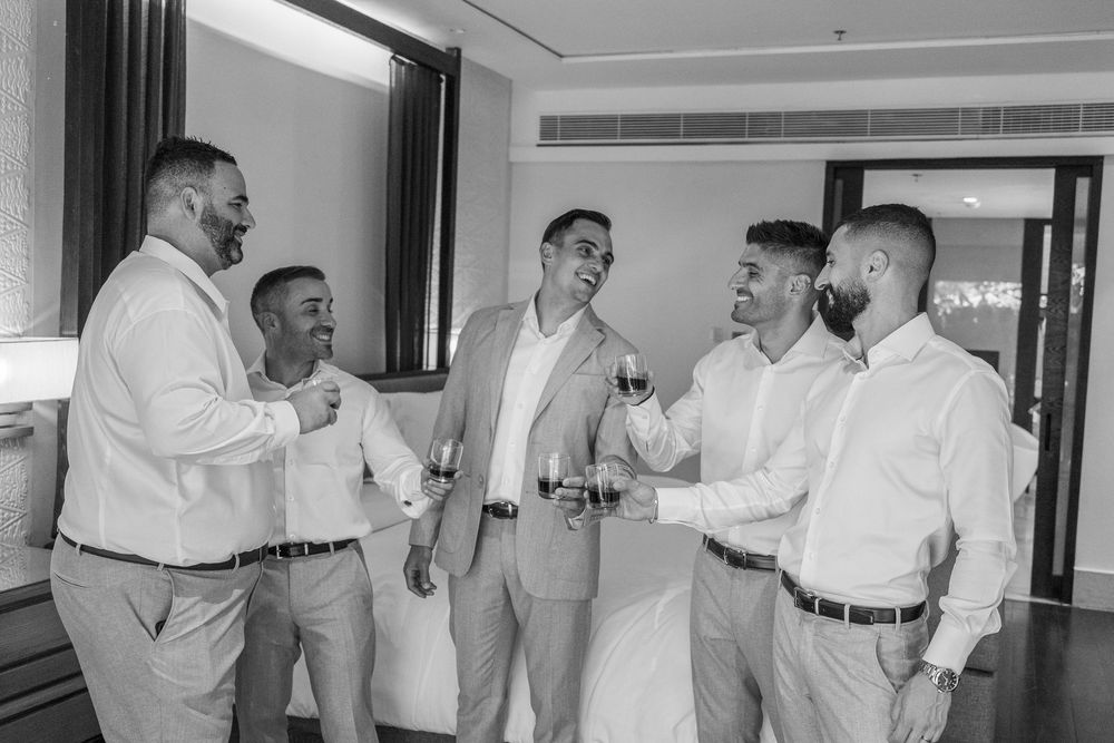 Groomsmen helping to get ready on wedding day, putting on ties and formal attire in a series of candid moments.