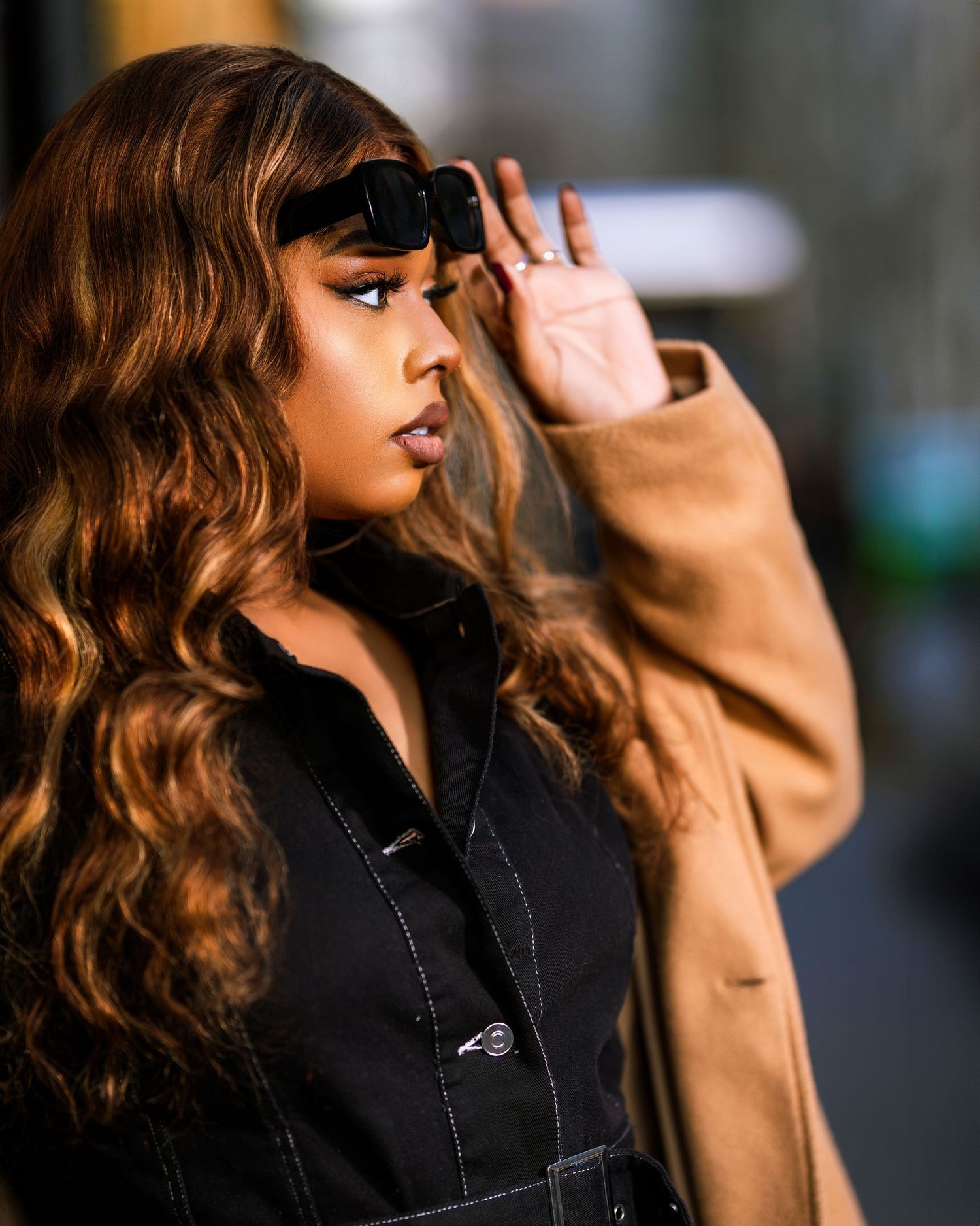 Cinematic lifestyle photo by Timoy B Photography in New York – luxury editorial for creative brand. Brooklyn Bridge