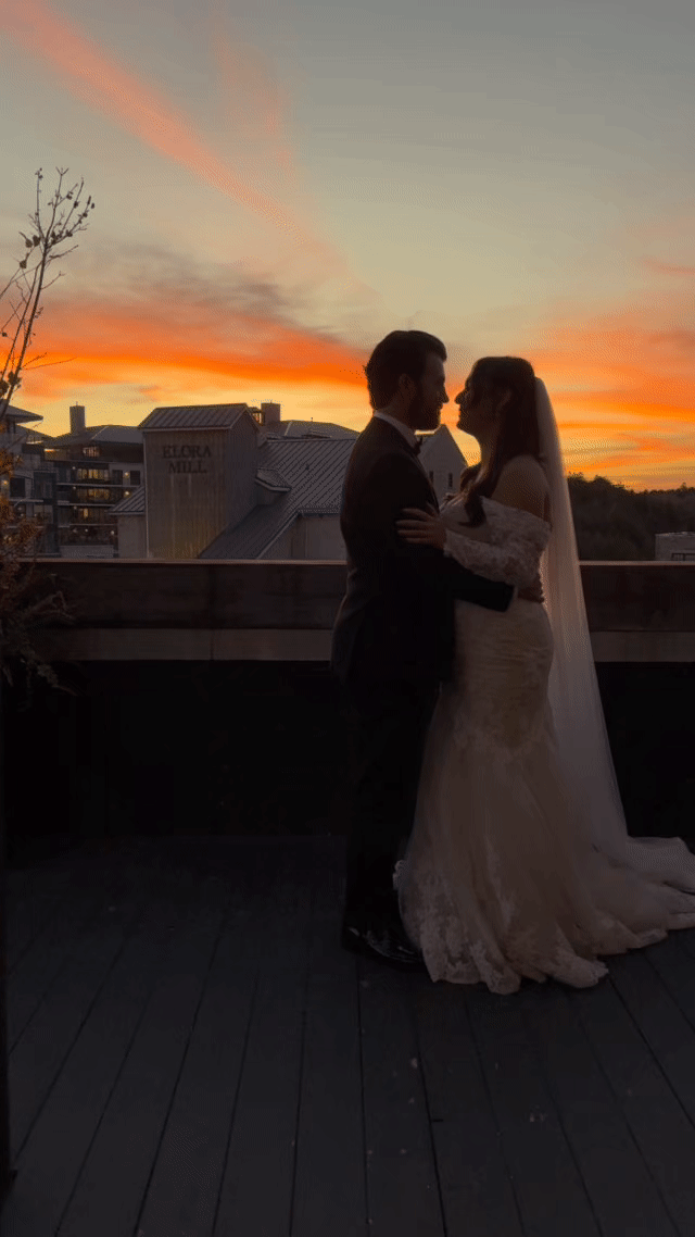 Bride and groom golden hour sunset photos at Elora Mill rooftop wedding