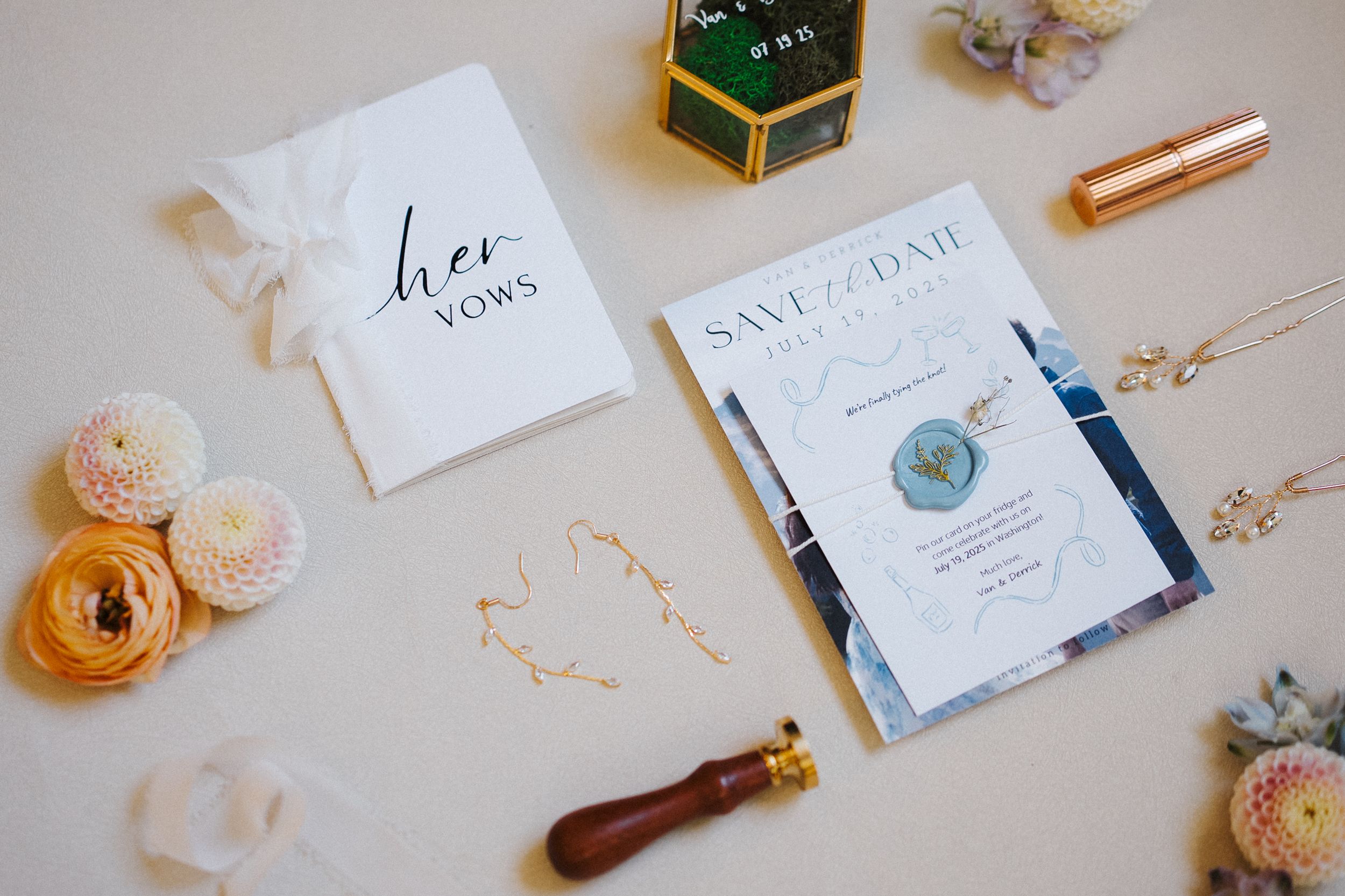 Wedding invitation and detail flat lay from a Lakewold Gardens wedding in Washington.
