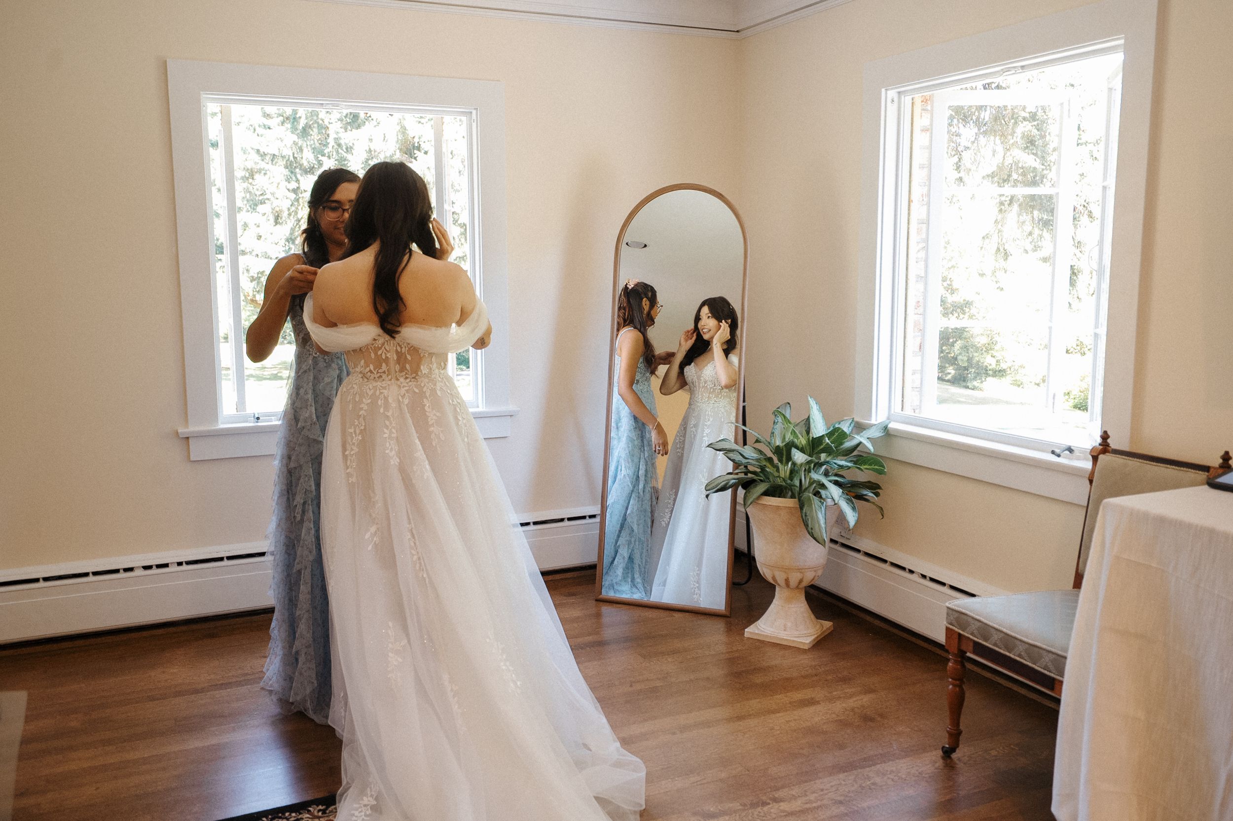 Van getting ready inside the Lakewold Gardens main house before her wedding ceremony.