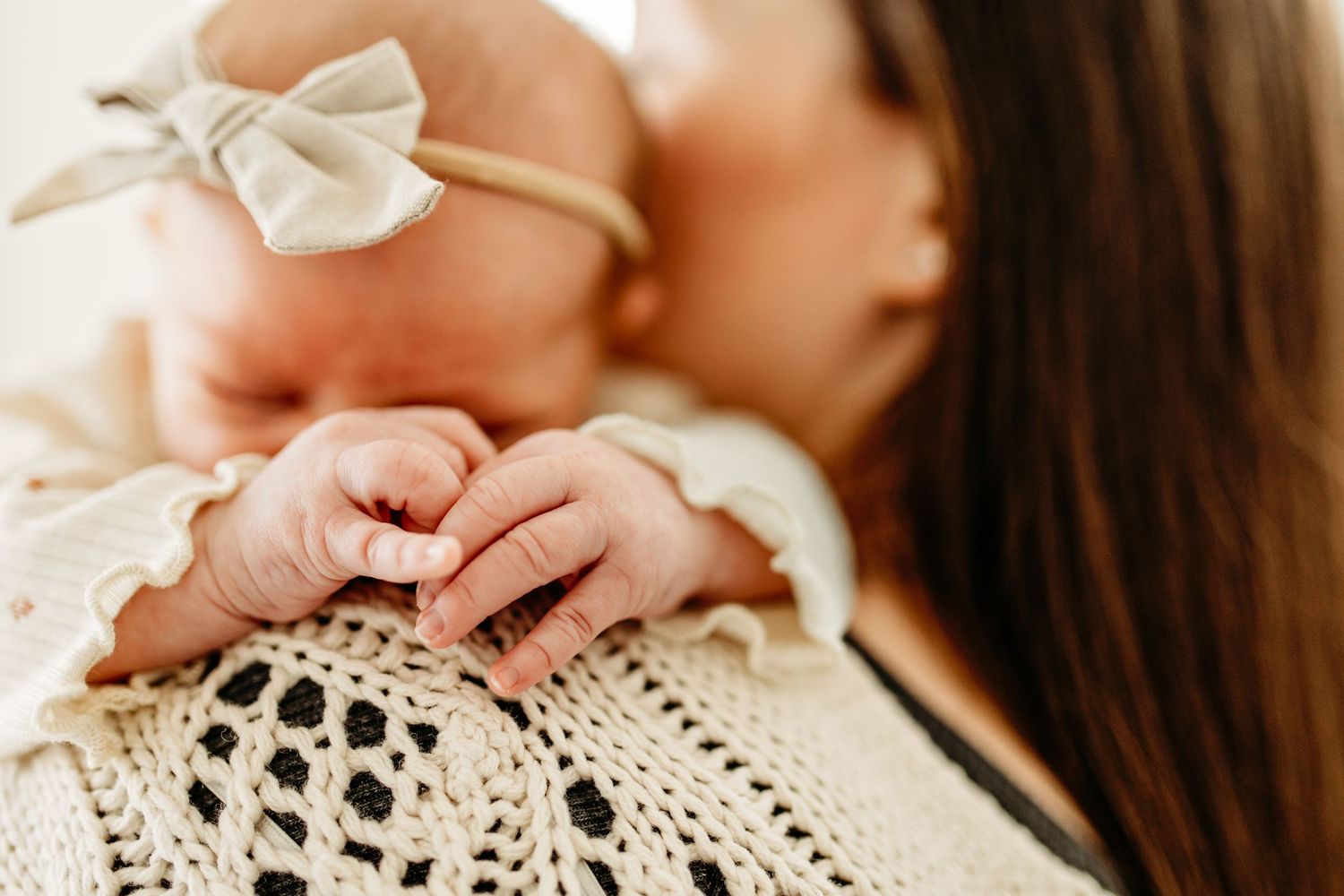Close-up of tiny baby hands.