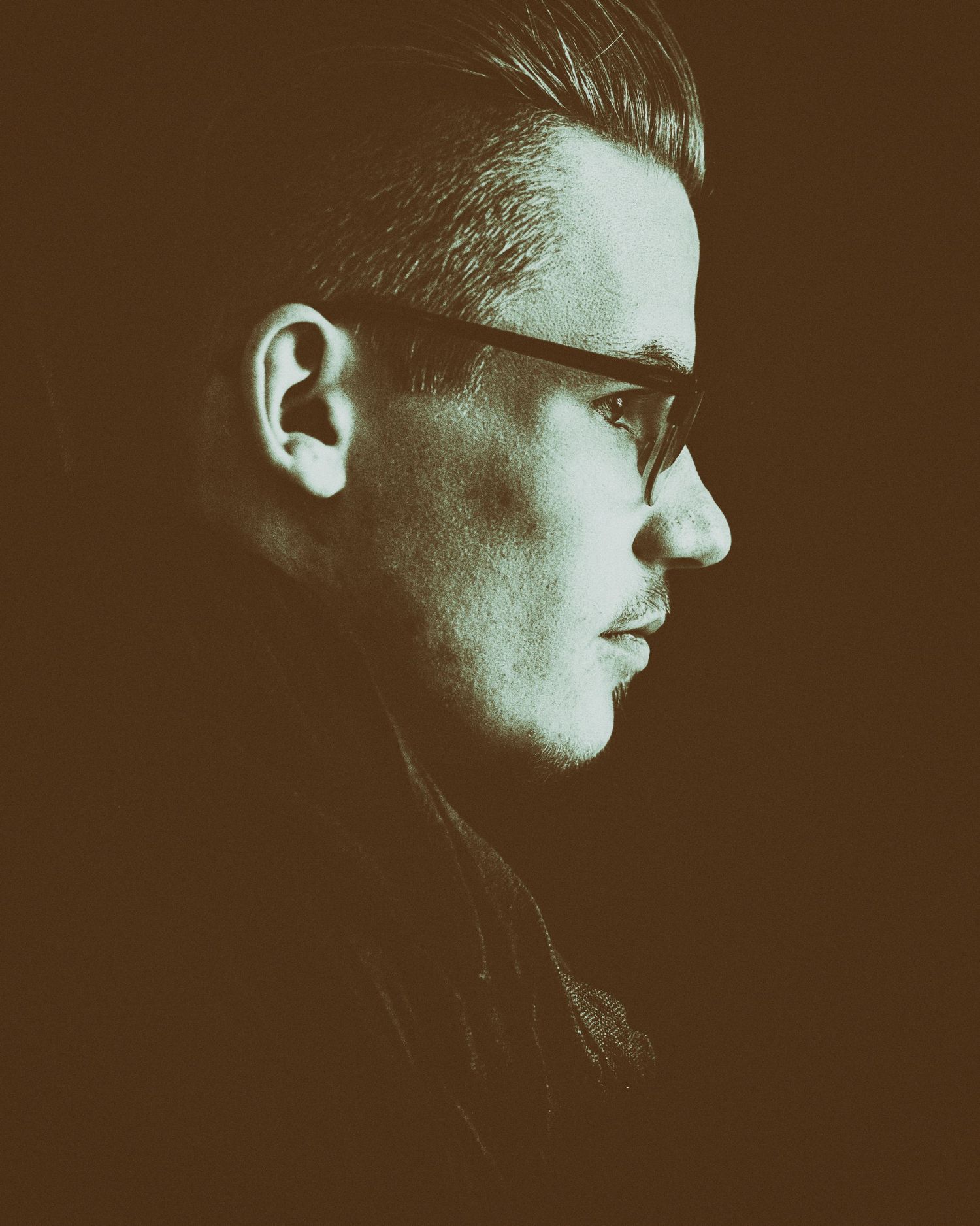 A series of moody profile silhouettes in sepia tones showing a shadowy figure against a dark background.