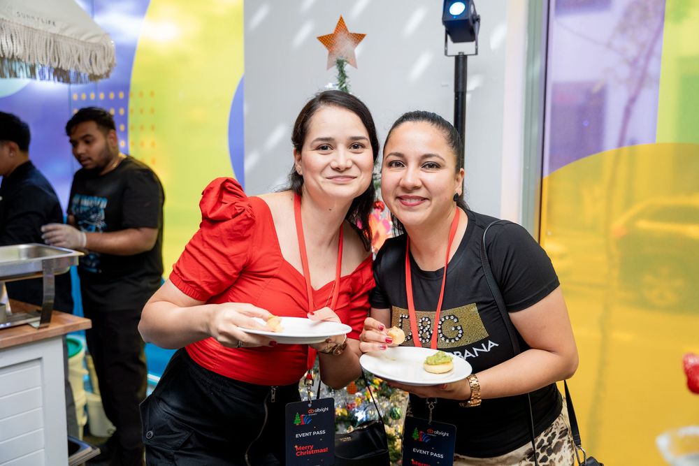 Event participants gathered around tables during a social networking function.