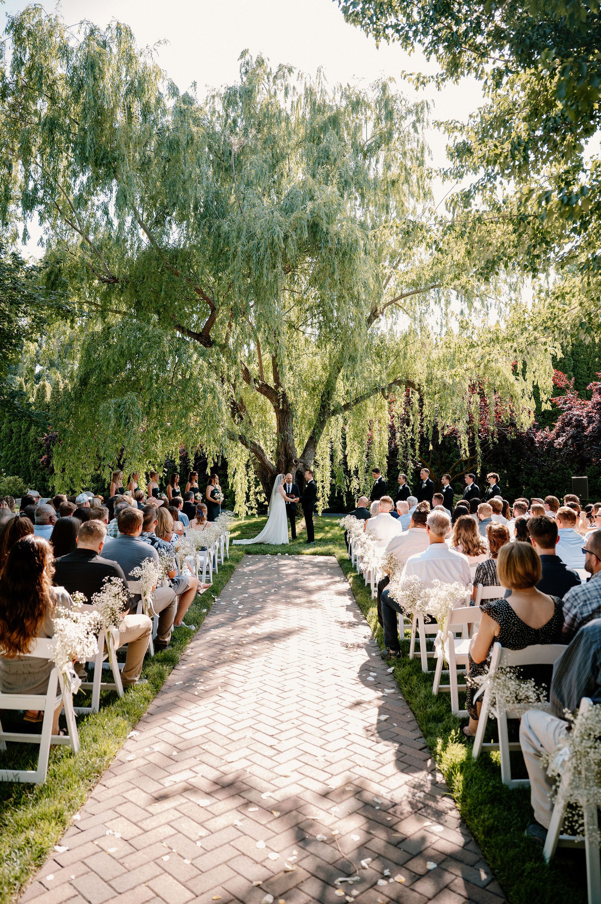 Summer wedding ceremony at Promise Garden in Pasco