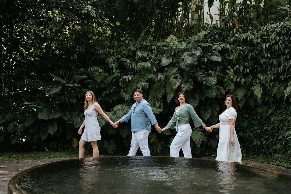Lifestyle family photoshoot at Komaneka Bisma with lush Ubud scenery.