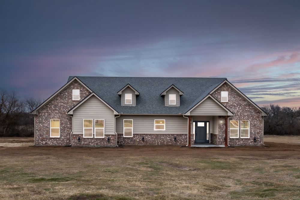 A modern ranch-style home with stone accents and multiple dormers is shown at different angles during sunset.