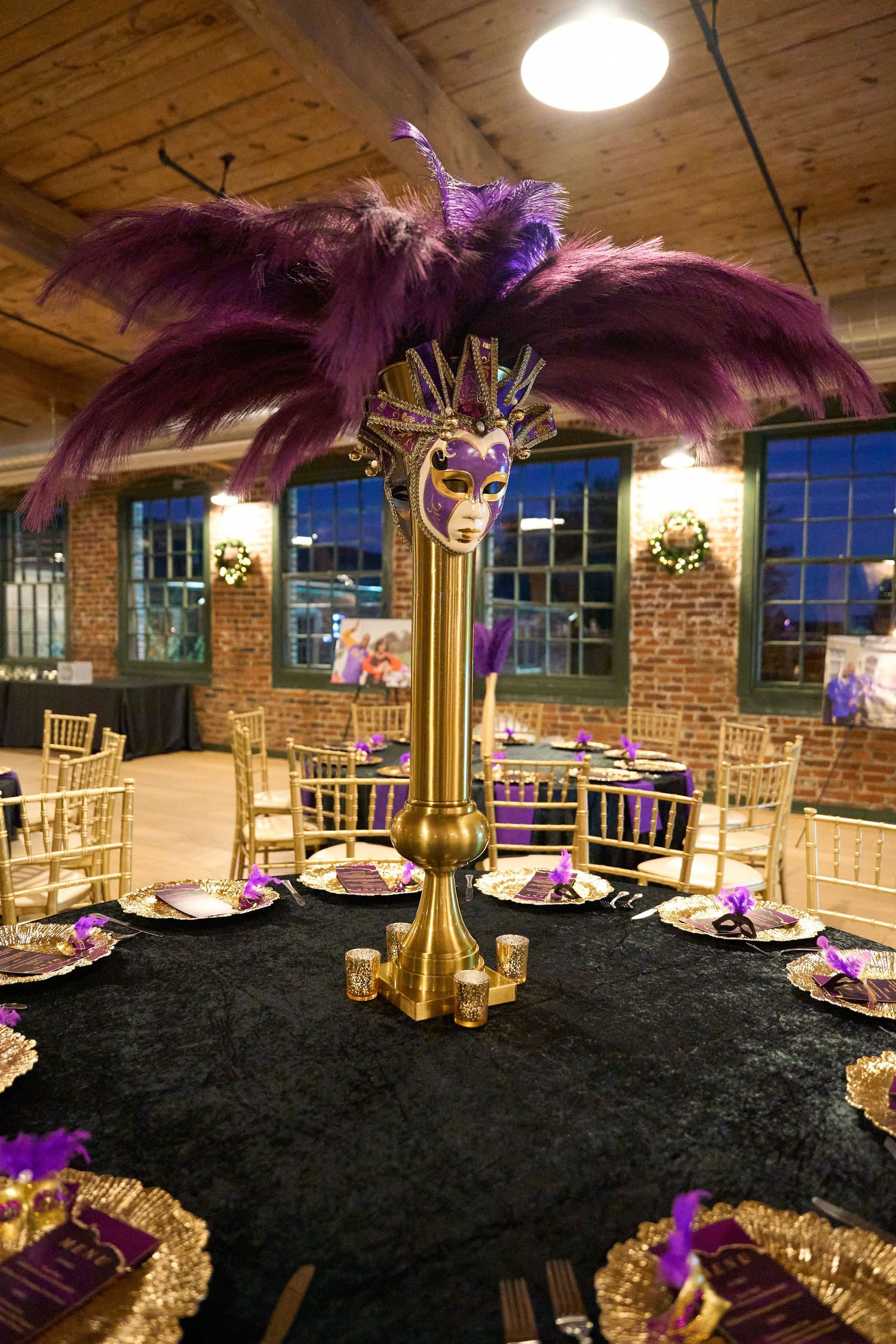 Elevated food platter suspended above a modern tabletop fire display showcasing gourmet appetizers and flames.