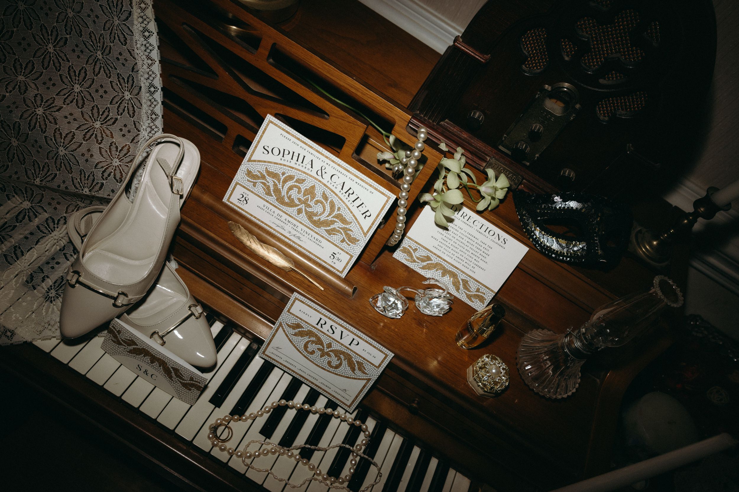 Dark and moody wedding detail shots featuring piano keys and artistic elements. Luxury Estate Wedding Photographer in NC