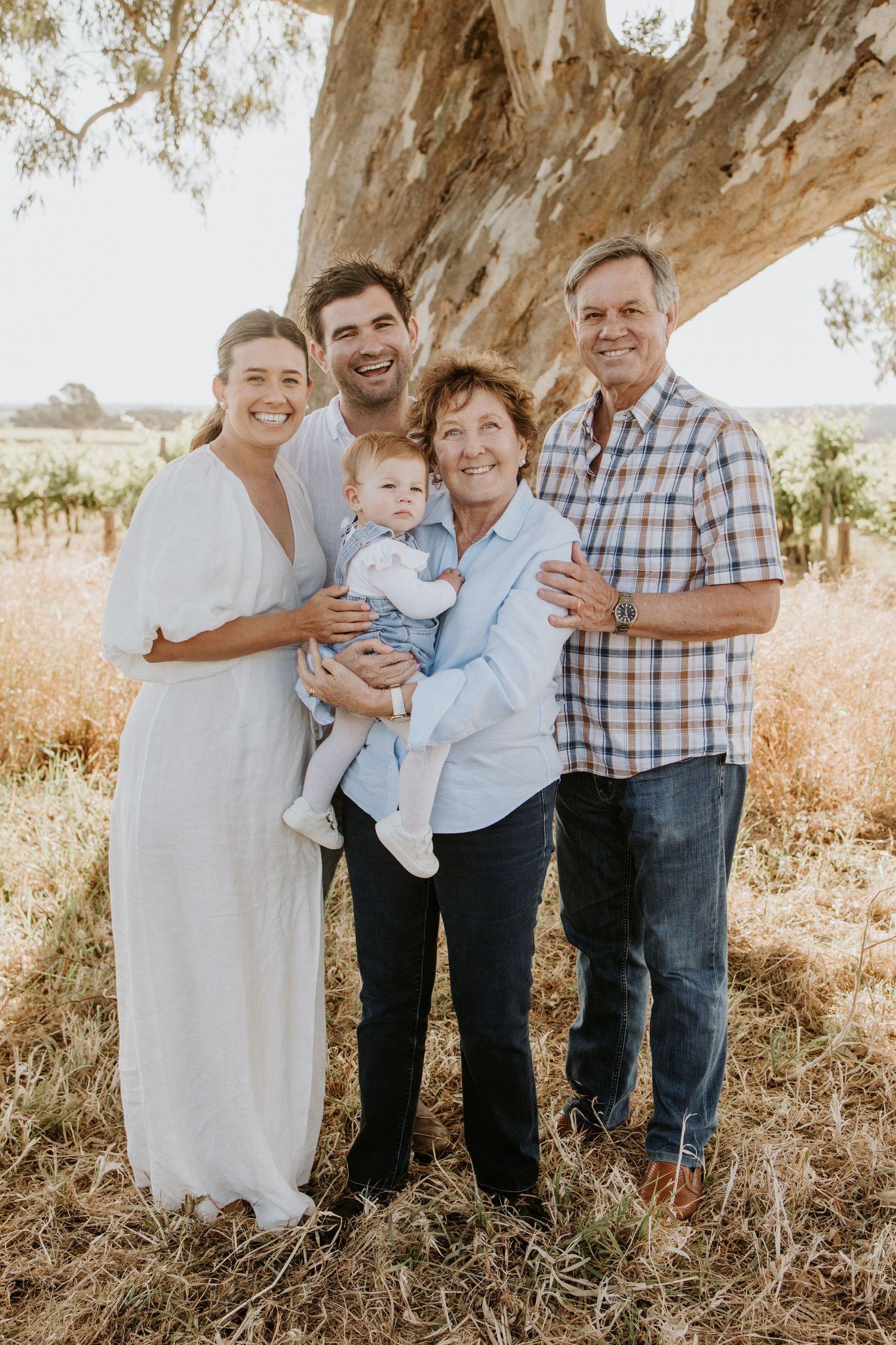 Extended family portrait session showing three generations together.