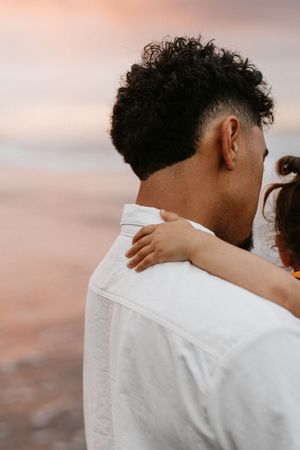 Soft focus romantic close-up shots on light background showing intimate moments.