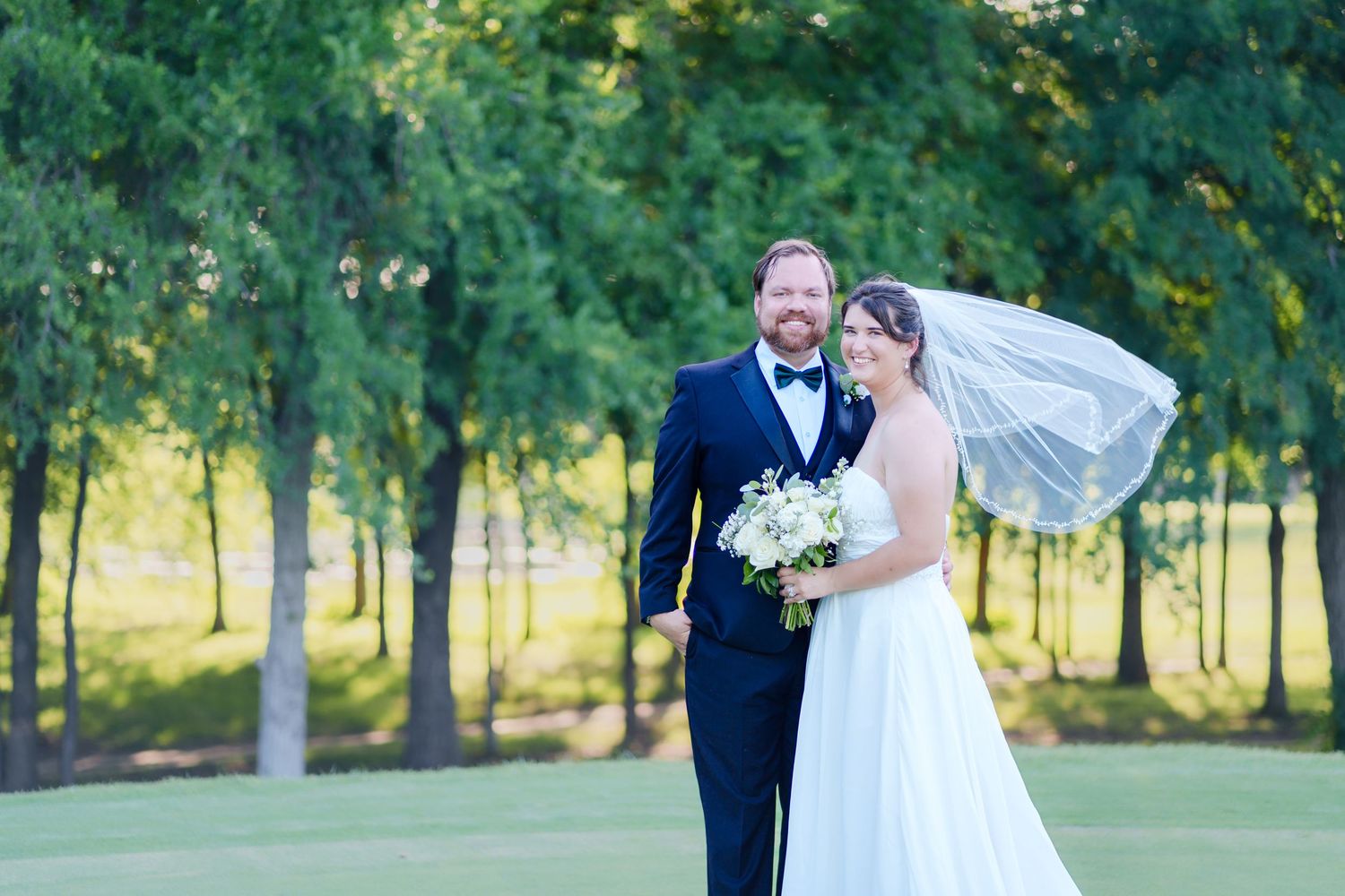 Wedding country club Sky Creek Ranch Keller, TX golf course wedding dress groom tuxedo wedding party sunset portrait ring shot just married
