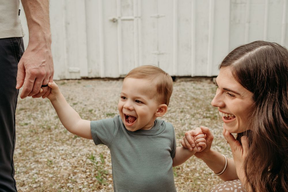 A series of candid expressions and laughter captured during an outdoor family photoshoot.