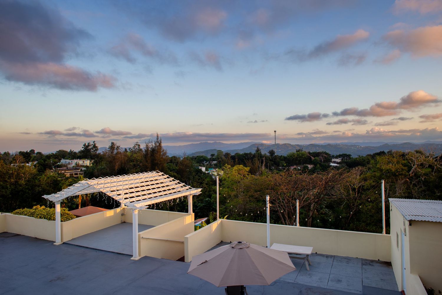 Real estate photo for a short-term rental in Aguas Buenas, Puerto Rico. Patio area / view.