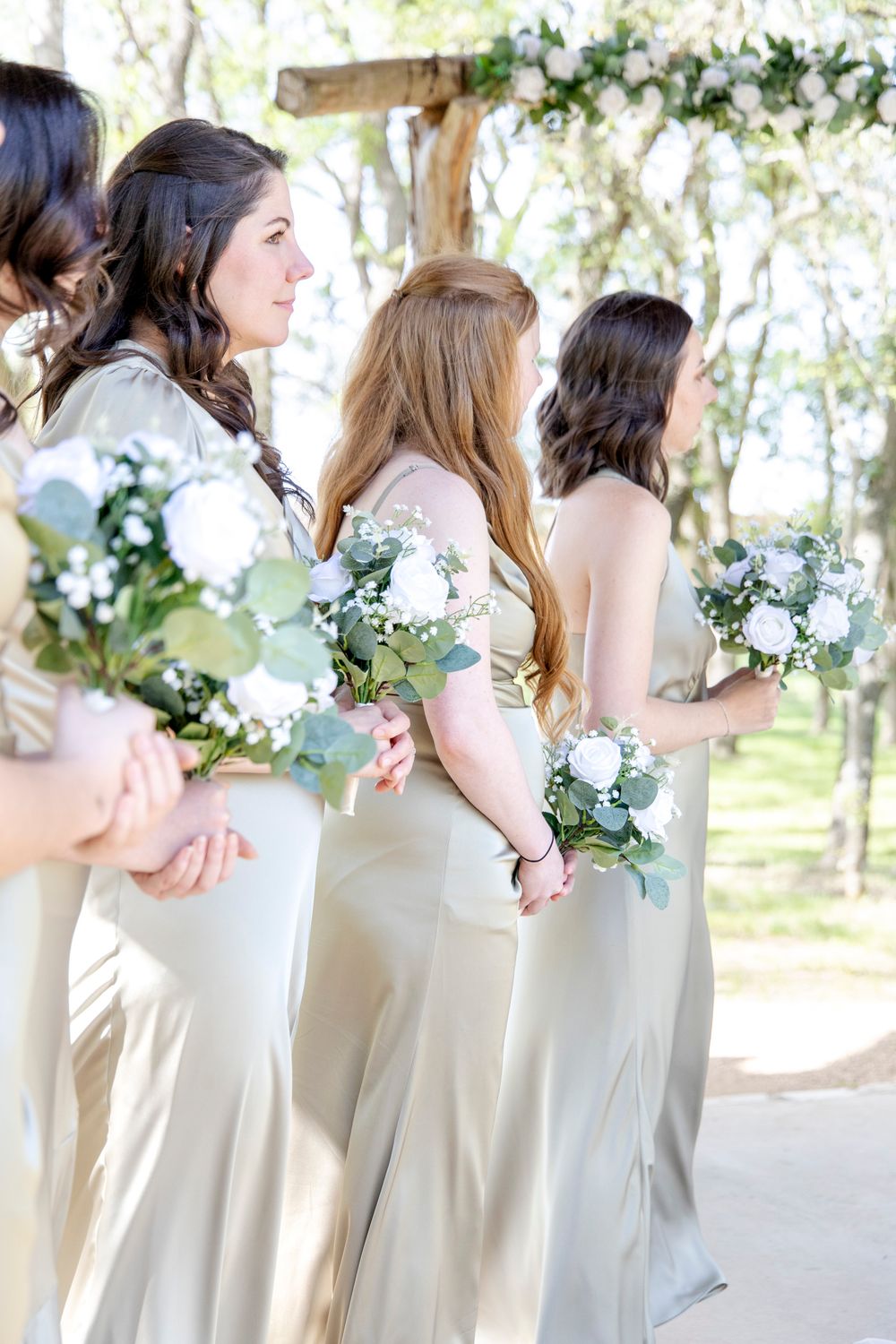 Fredericksburg wedding featuring bridesmaids in sage green.