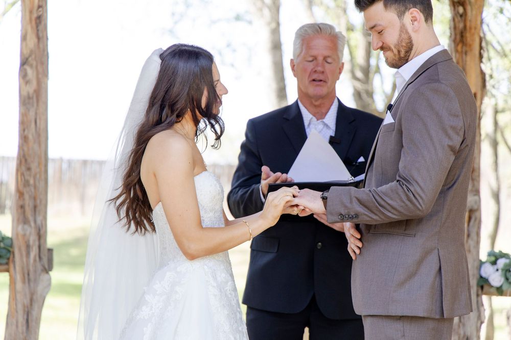 Dripping Springs outdoor wedding vows at sunset with hill country views