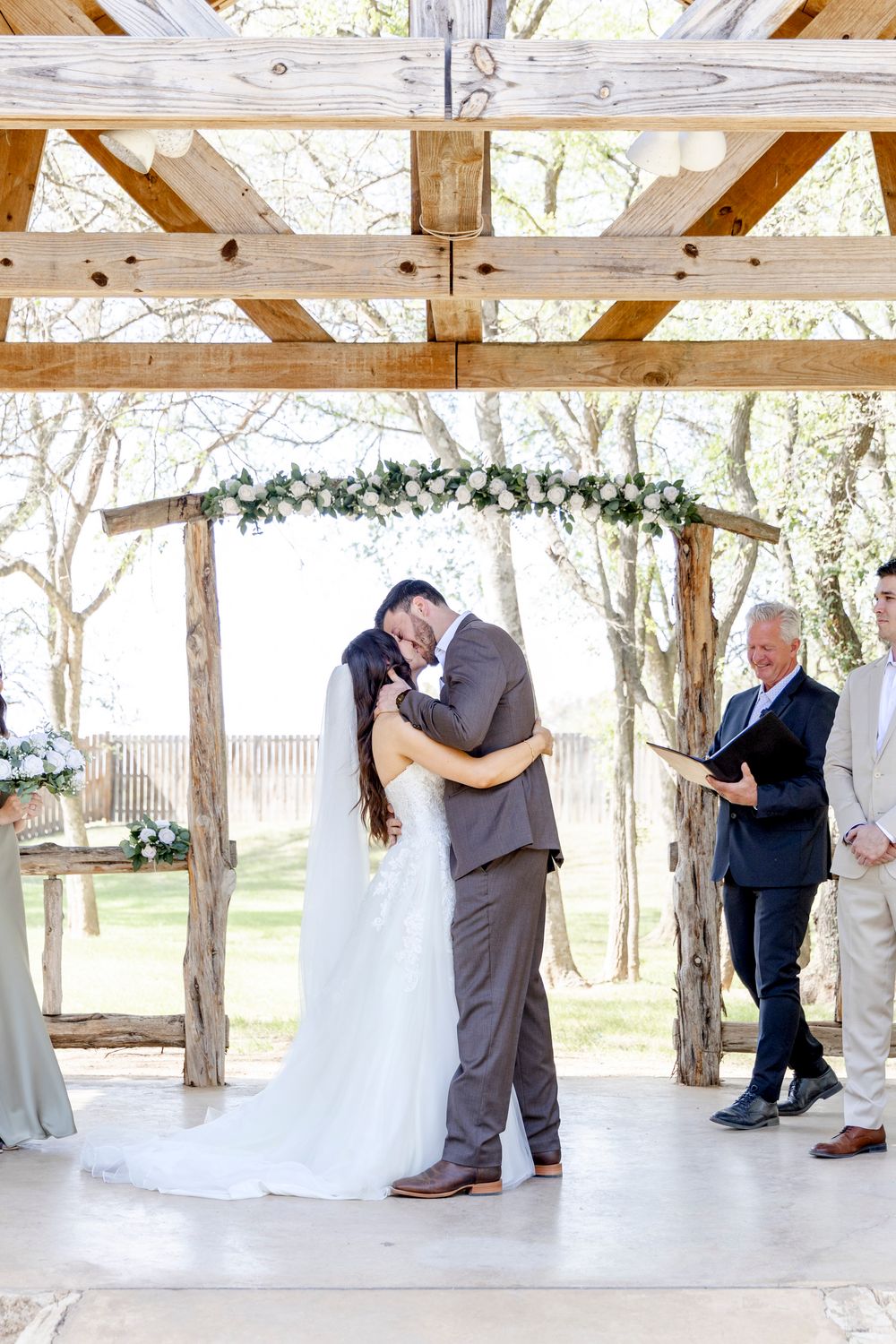 Bride and Groom first kiss at a luxury wedding in Austin Texas.